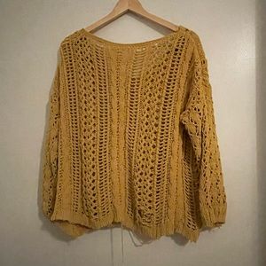 yellow sweater